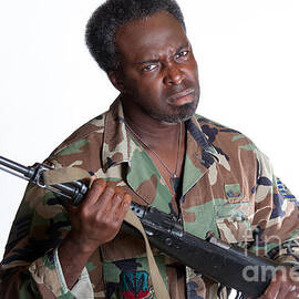 African American man with gun