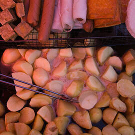Fried Potatoes And Snacks On The Grill by Panoramic Images