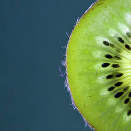 Slice Of Kiwi Fruit by By Felix Schmidt