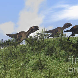 Two Utahraptors Chasing A Gigantoraptor by Kostyantyn Ivanyshen
