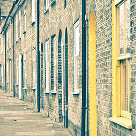 Yellow door by Tom Gowanlock