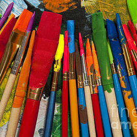 Paintbrushes Lined Up On Palette by Jim Corwin