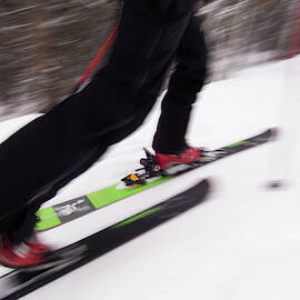 A Man Backcountry Skiing In Colorado by Tom Bol