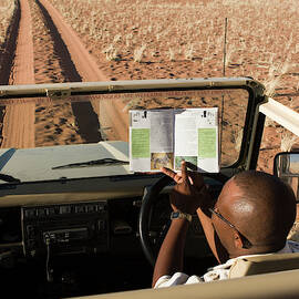 A Man Reads An Explanation Of Animal by Jen Judge