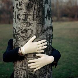 A Model Hugging A Tree by Frances Mclaughlin-Gill