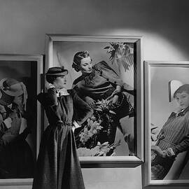 A Model In Front Of Photographs by Horst P. Horst