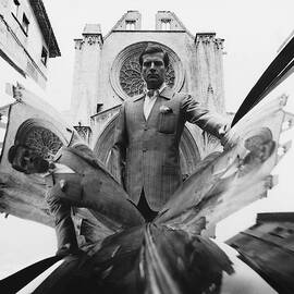 A Model Standing In Front Of A Cathedral by Leonard Nones
