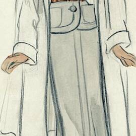A Model Wearing A Coat And Suit by David