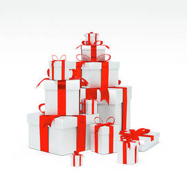 A Stack Of Silver Present Boxes With by Doug Armand
