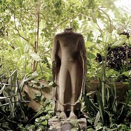 A Statue Of Buddha by Henry Clarke