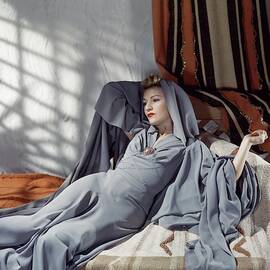 Annabella Wearing A Gray Crepe Dress by Horst P. Horst