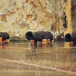 Cannons In The Rain At El Morro, San Juan by Marcus Dagan