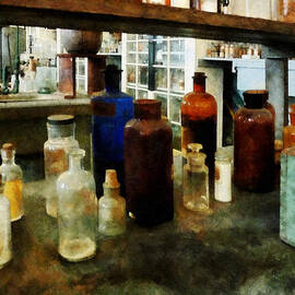 Chemistry - Assorted Chemicals in Bottles by Susan Savad
