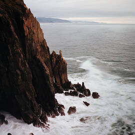 Churning Ocean At Edge Of Cliffs by Danielle D. Hughson