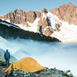 Climbers Scouting Thier Route While by Josh Miller