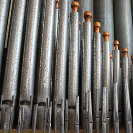 Close Up Of Silver Pipes On A Musical by John Short / Design Pics