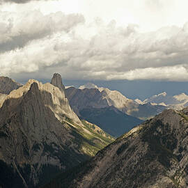 Cloud Over Rugged Mountain Peaks by Jim Julien / Design Pics