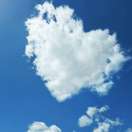 Clouds Forming Heart In Sky by Yuji Sakai