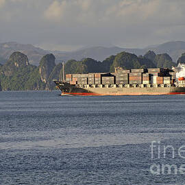 Container ship in Halong Bay by Sami Sarkis Photography