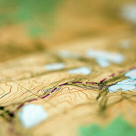 Detail View Of A Paper Map Showing by Dan Shugar