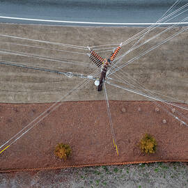 Directly Above View Of Utility Pole by Peter Essick