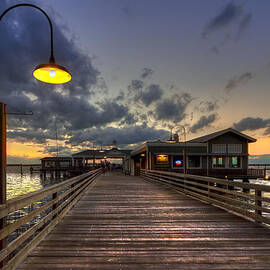 Dock lights at Jekyll Island by Debra and Dave Vanderlaan