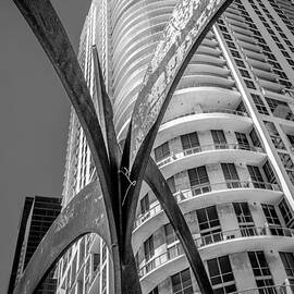 Element of Duenos do los Estrellas statue with Miami downtown in background - Black and White by Ian Monk