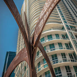 Element of Duenos do los Estrellas statue with Miami downtown in background  by Ian Monk