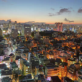 Elevated View Of Gangnam Illuminated At by Allan Baxter