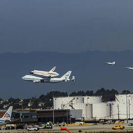 Endeavor foies first of two Flyovers over LAX by Denise Dube