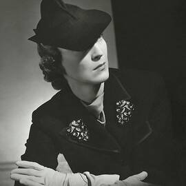 Evelyne Greig Modeling A Military Hat by Horst P. Horst