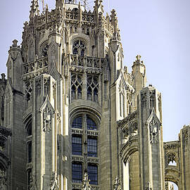 Flag Flying High Tribune Tower by Julie Palencia
