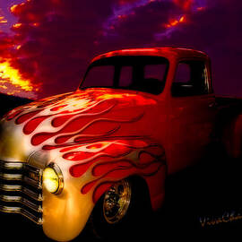 Flaming Chevy Pickup and a Sundowner Picnic by Chas Sinklier