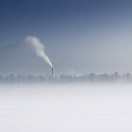 Fog Over  Frozen River With Fuming Pipe by Dmitry Savin