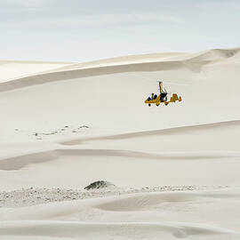 Gyro-copter Flight Through A Dune by Peter Chadwick