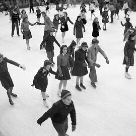 Ice Skating In Rockefeller Center, 1941 by Science Source