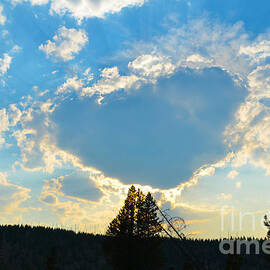 Illuminated Heart Cloud at Yellowstone by Debra Thompson