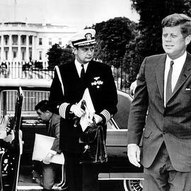 John F. Kennedy Exits Limo In Front Of White House by Retro Images Archive