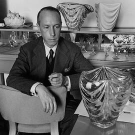 Joseph B. Platt With A Vase Of His Own Design by Luis Lemus