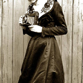 Kodak Girl with a Folding Camera circa 1918 by Monterey County Historical Society