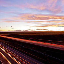 Light Streaks From Automobiles On A by Adam Hester