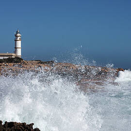 Lighthouse And Breaking Wave by Siegfried Layda