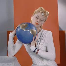 Lisa Fonssagrives Holding A Globe by Edward Steichen