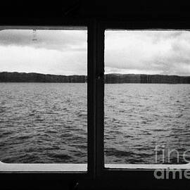 looking out of ships windows at the Beagle Channel and Isla Navarino Tierra Del Fuego Chile by Joe Fox