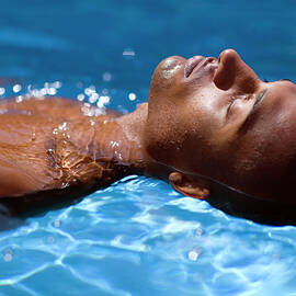 Man Floating by Science Photo Library