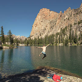 Man Jumping Into One Of Saddleback by Matt Andrew