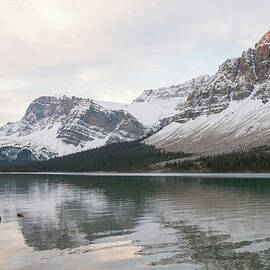 Man Stands In Lake, Composes Picture Of by Ascent Xmedia