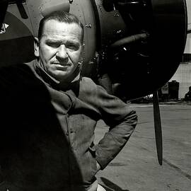 Metro-goldwyn-meyer In Front Of An Airplane by Imogen Cunningham