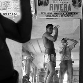 Muhammad Ali Drinking  by Retro Images Archive