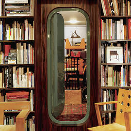 Neatly Arranged Bookshelf by Scott Frances